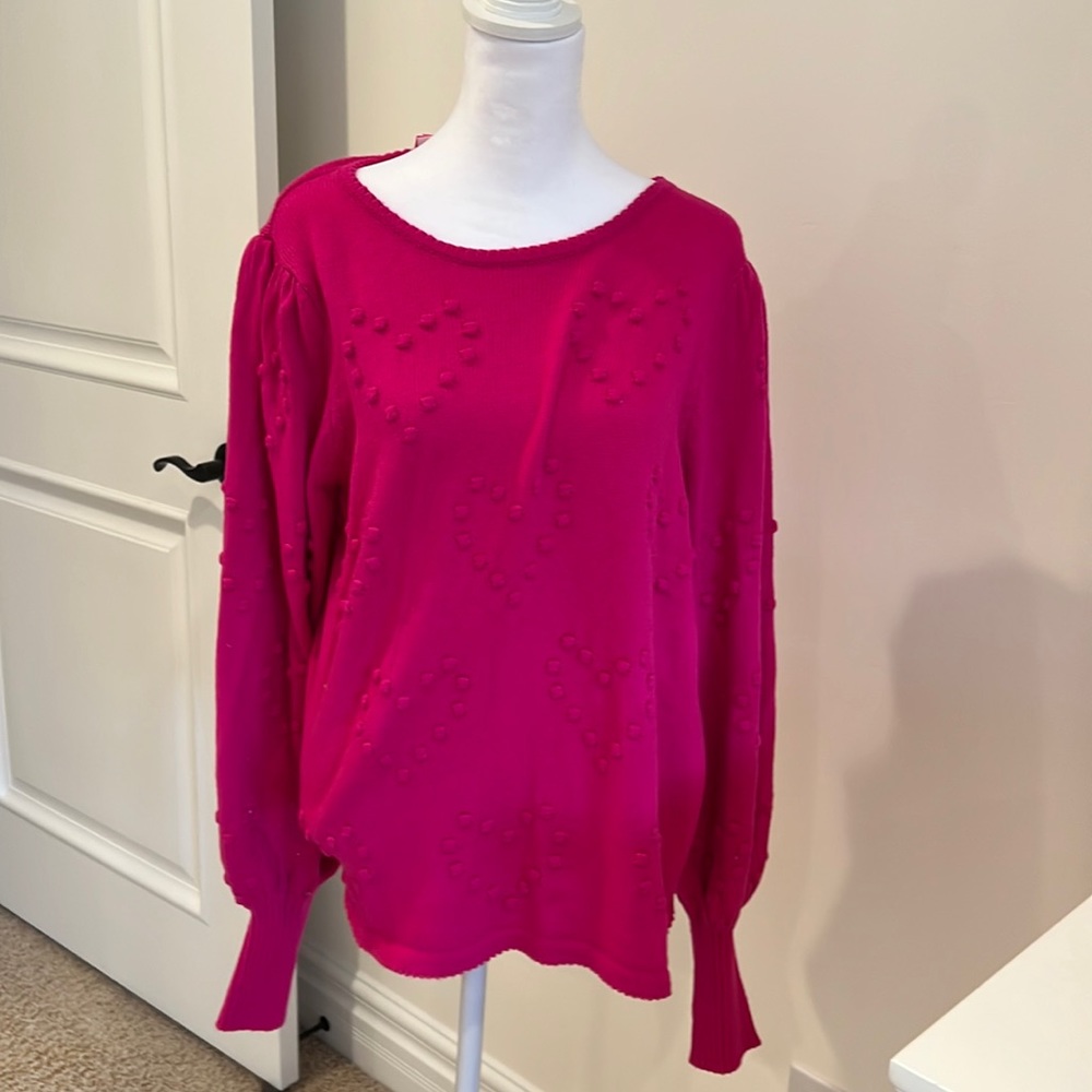 Beautiful sweater brand new.